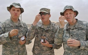 Three troops overseas enjoying world class cupcakes from Wicked Good Cupcakes. 