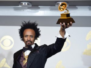 Fantastic Negrito poses backstage with the award for best contemporary blues album